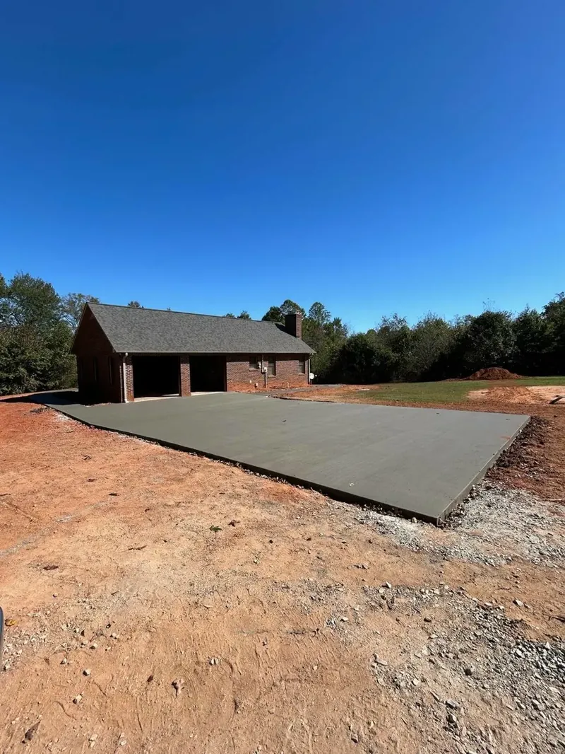 Freshly poured residential concrete slab for a home addition in Denver, NC — Old North Concrete Co.