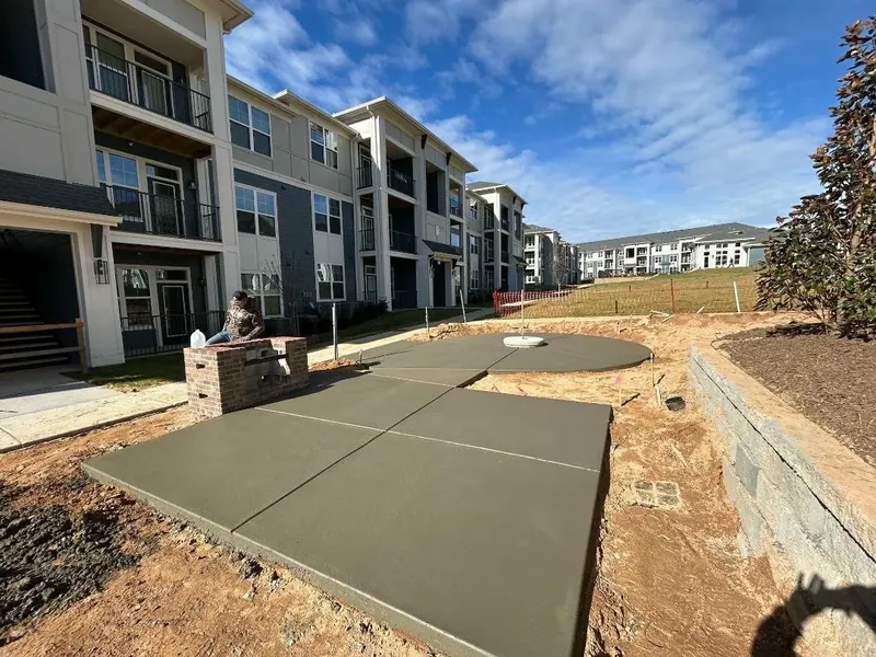 Fresh concrete slab being poured and finished in Mooresville, NC — Old North Concrete Co.
