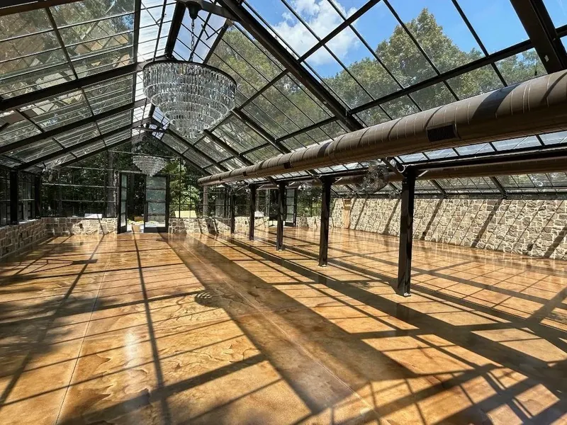 Sealed stamped concrete event venue floor with gray ashlar pattern — Old North Concrete Co.