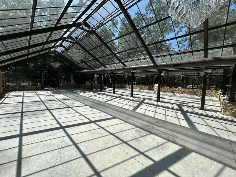 Large stamped concrete interior floor in an event venue with gray tones — Old North Concrete Co.